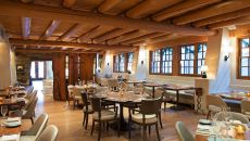 Anasazi Dining Room Merriam001 at Rosewood Inn of the Anasazi