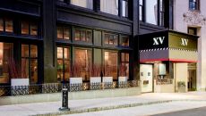 Hotel Entrance at Night Valet Parking Sign