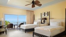 Beach Front Lanai King bed and view  at The Kahala Hotel