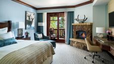 blue bedroom with fireplace