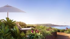 Loungers with umbrella, view