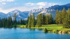 golf course with water view