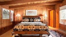 cedarcabin bedroom jessicabrownphotography 49585630897 o at Triple Creek Ranch