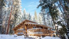 bitterroot one bedroom luxury cabin exterior winter 52960724379 o at Triple Creek Ranch