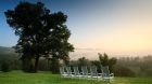See more information about Blackberry Farm exterior lawn chairs countryside morning mist