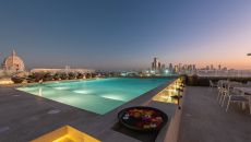 night pool view at Hotel Charleston Santa Teresa