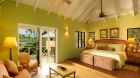 See more information about Nisbet Plantation Beach Club bedroom green
