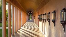 Exterior corridor leading to main swimming pool