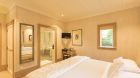 kauri cliffs deluxe family suite second bedroom and bathroom copy.
