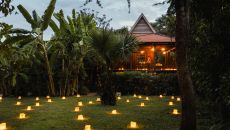 Amansara, Cambodia Activities, Khmer Village House, Twilight Dinner, Exterior, Evening Setting, Lantern 35857 Amansara 2024