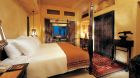 guestroom four post bed with terrace