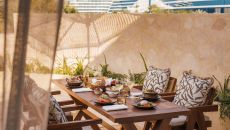 Al Bahar Villas Balinese Dinner Exterior Dining Wide at Jumeirah Beach Hotel