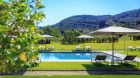 Pool and sunchairs Villa La Massa