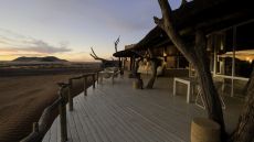 tent desk overlooking desert