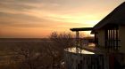 See more information about Little Ongava deck overlooking desert