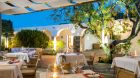 Outdoor dining Elounda Beach Hotel 2019.