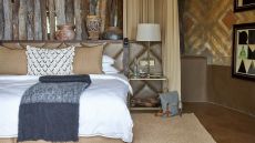 bedroom 2 with bag Singita Pamushana Lodge