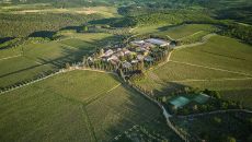 Borgo San Felice Resort Panoramic view of vineyard and Borgo at Borgo San Felice Resort
