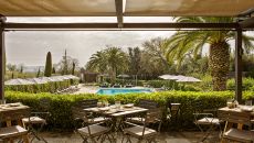 See more information about Mas De Torrent poolside dining