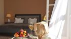Bedroom and champagne at Kempinski Grand Hotel des Bains