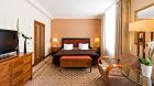 Bed and TV at Kempinski Grand Hotel des Bains