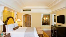 Tower suite bedroom at The Leela Palace Bengaluru