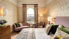 The Balmoral Deluxe Castle View Room Bed