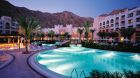 Outdoor pool and bar night