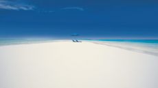 private island beach lounging