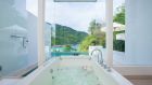 grand pool suite with seaview bath