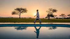 Outdoor pool at sunset