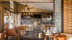 Singita Sabora Main Lodge Dining Area scaled Singita Grumeti Sabora Tented Camp