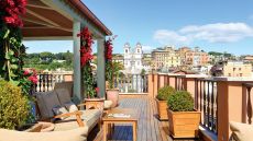 See more information about Portrait Roma rooftop  portrait roma