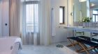 white bathroom with bathtub