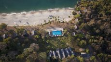 Hotel aerial with beach and pool