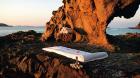 beach massage on rocks