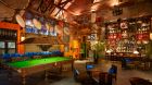 Lounge with pool table and bar