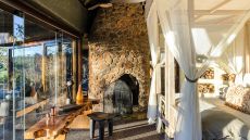 White bedroom with stone accents