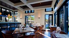 Outdoor pool with sunset