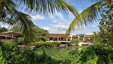 The Lawn view towards Lobby at Rosewood Mayakoba