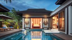 Two Bedroom Family Pool Villas Exterior View From The Pool Sunset Time at Anantara Mai Khao Phuket Villas