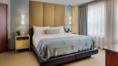 queen bed at Battery Wharf Hotel