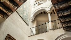 Reception looking up at beams arches