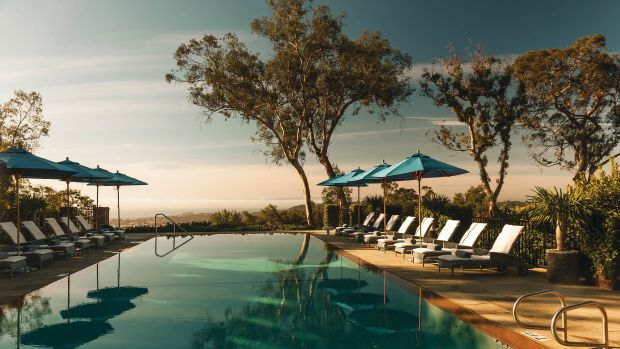 El Encanto, A Belmond Hotel, Santa Barbara - stunning poolside lounge area with a pop of blue textiles