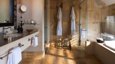 Spa-style bathroom at Four Seasons Safari Lodge