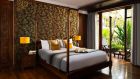 Guest room Henri Mouhot Suite Bedroom Anantara Angkor Resort