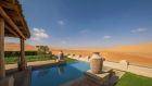 guest room pool with desert view Qasr Al Sarab