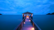 private dining pavilion overwater night