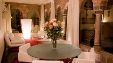 sitting area with exposed brick