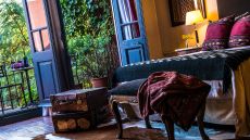 rustic bedroom at Jardin Escondido